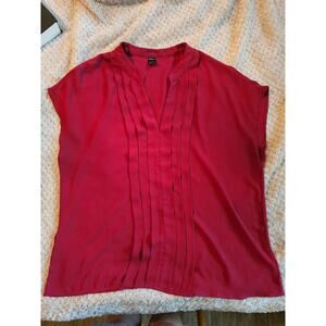 red pull over blouse